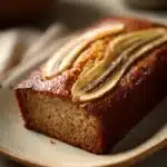 Close-up of freshly baked Jamaican banana bread with a clean background