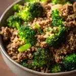 Close-up of ground beef and broccoli fried quinoa with vibrant colors