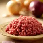 Close-up of a ground beef dish with bright lighting and clean background