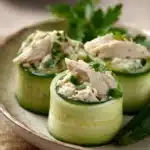 Close-up of high protein chicken salad cucumber roll with fresh ingredients