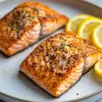 Close-up of salmon cooked in a ninja air fryer with a clean background