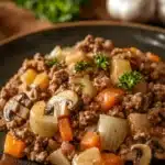 Close-up of a cozy ground beef dinner with bright natural lighting and a clean background.