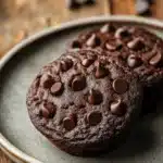 Close-up of double chocolate protein muffin tops by Joy Bauer with a clean background.