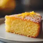 Close-up of a lemon cake with high altitude adjustment, showcasing bright and warm lighting.