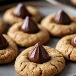 Close-up of peanut butter Hershey kiss cookies on a clean background