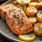 Close-up of a salmon and potato dinner with bright natural lighting