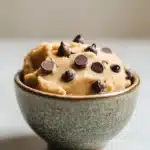 Close-up of keto edible peanut butter cookie dough with a clean background